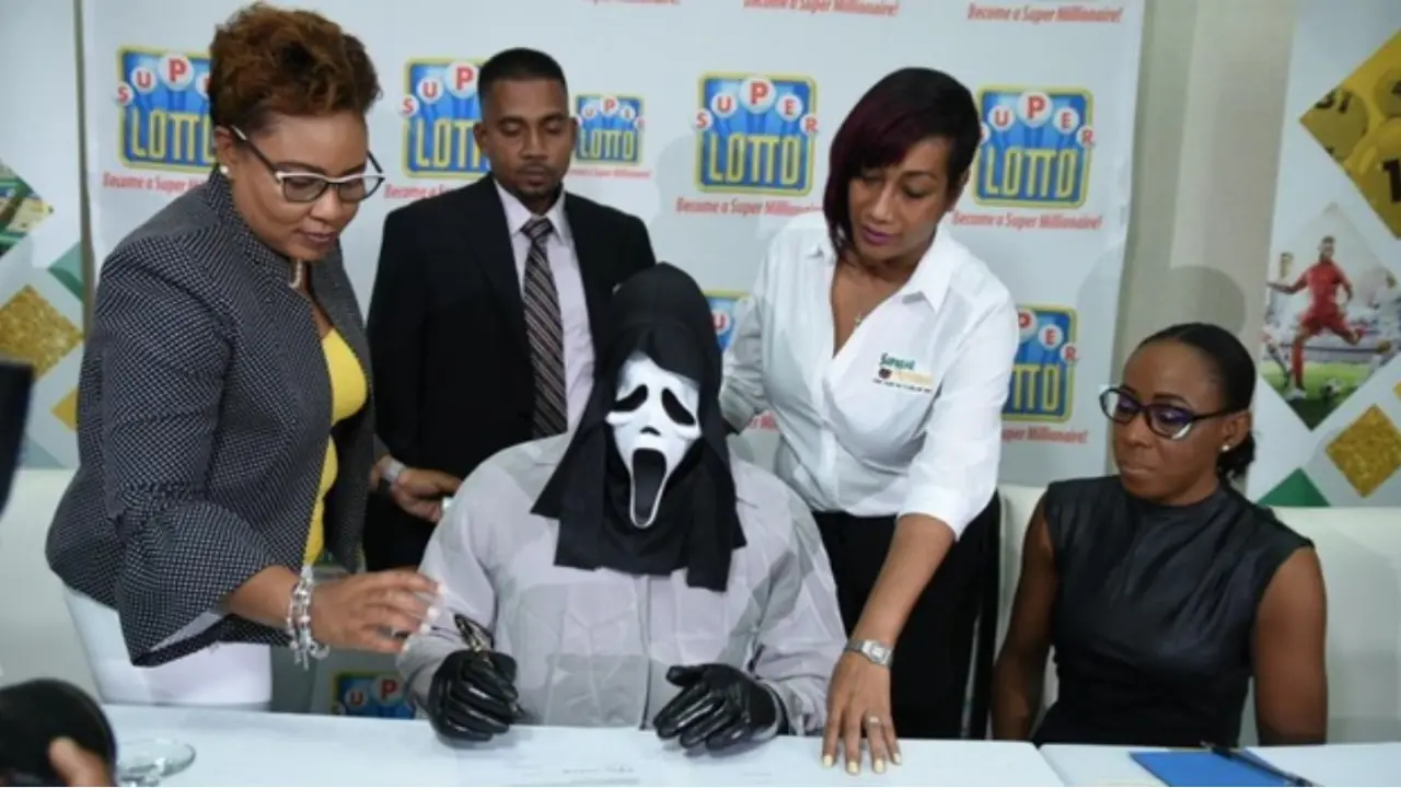 Lottery Winner in Jamaica Wore a Scary Mask To Collect £1M Lottery Money So His Relatives Won't Hound For Money